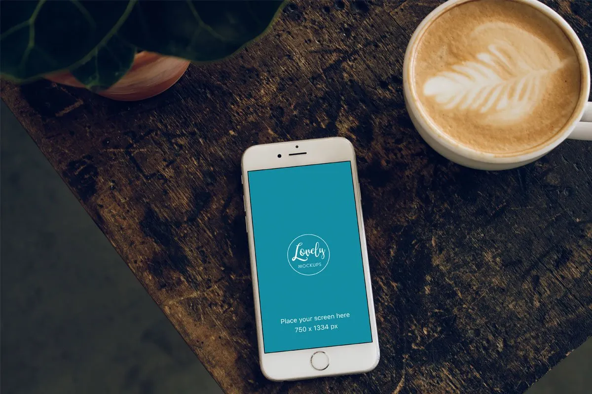 Free White iPhone 8 Mockup with Coffee Mug on Vintage Wooden Table